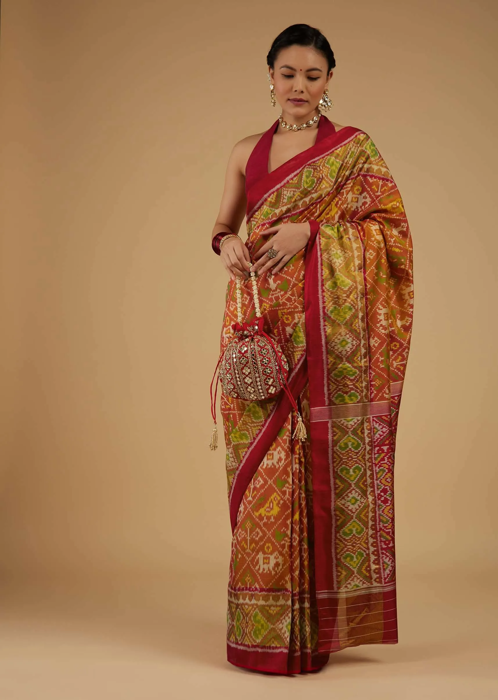 Fire Orange Saree In Silk With Ikat Weave Patola Work