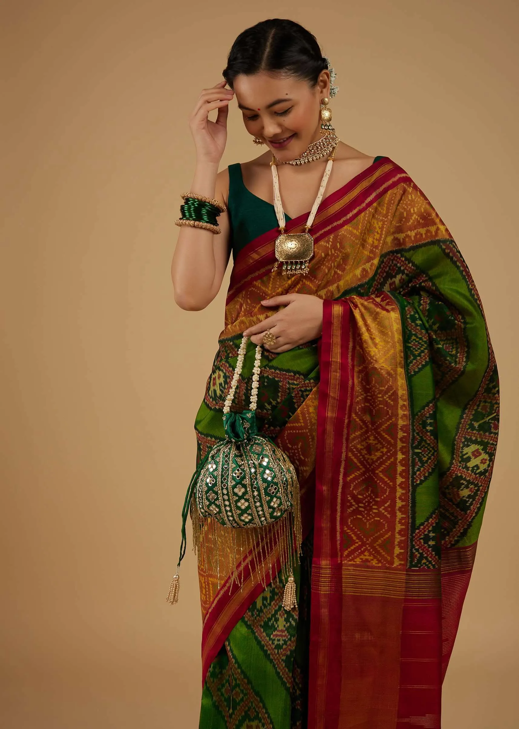 Forest Green Saree In Silk With Ikat Weave Patola Work
