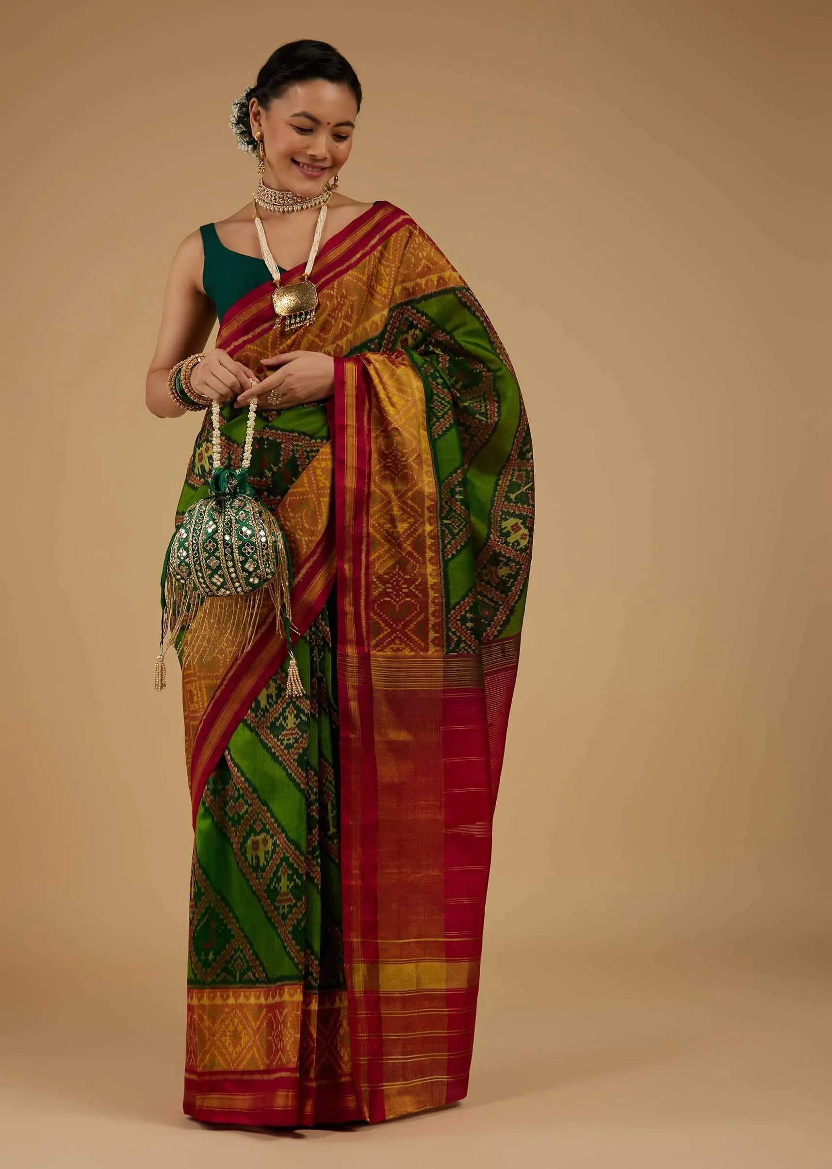 Forest Green Saree In Silk With Ikat Weave Patola Work