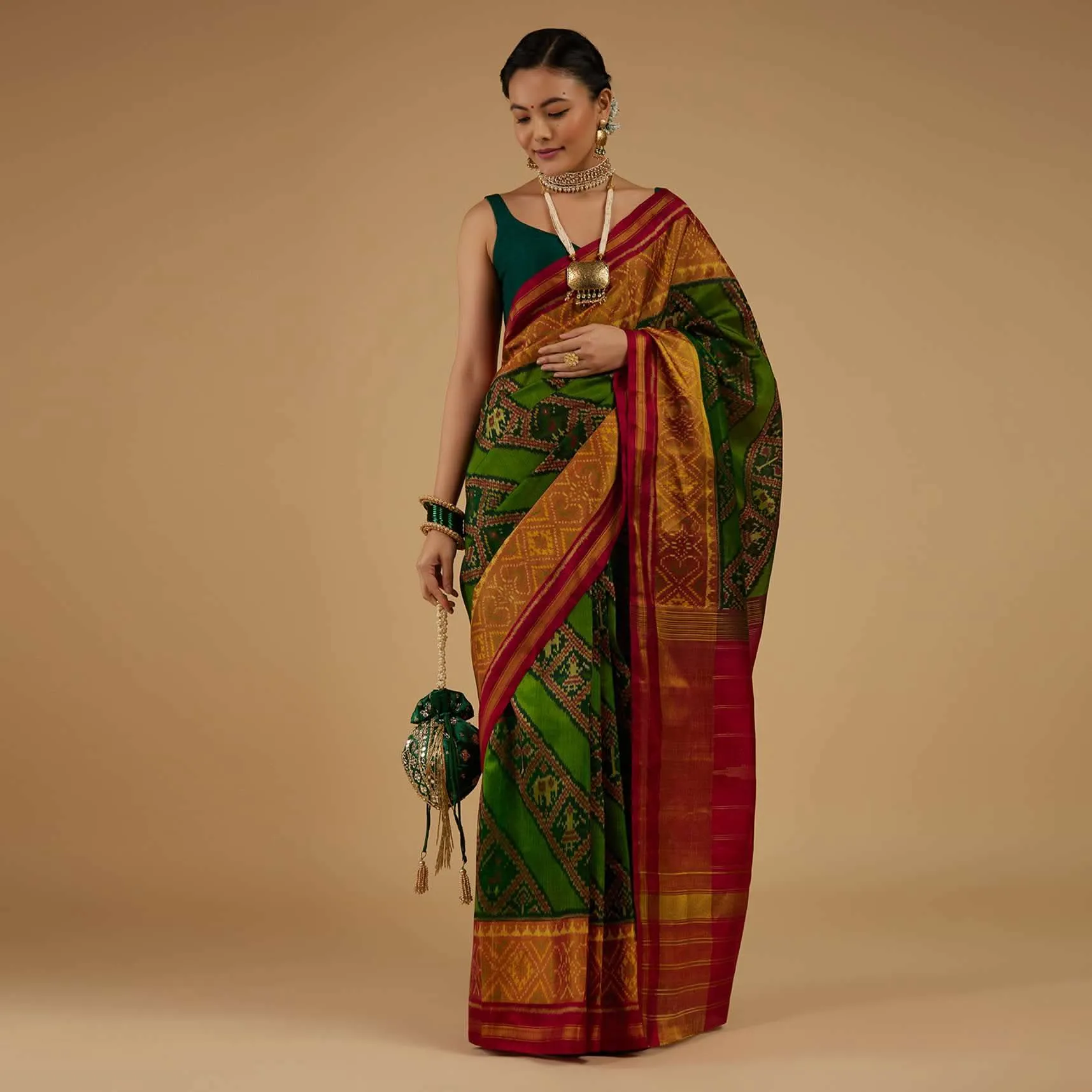 Forest Green Saree In Silk With Ikat Weave Patola Work