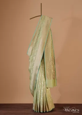 Green Handloom Banarasi Saree In Uppada Silk With Floral Jaal Weave And Unstitched Blouse